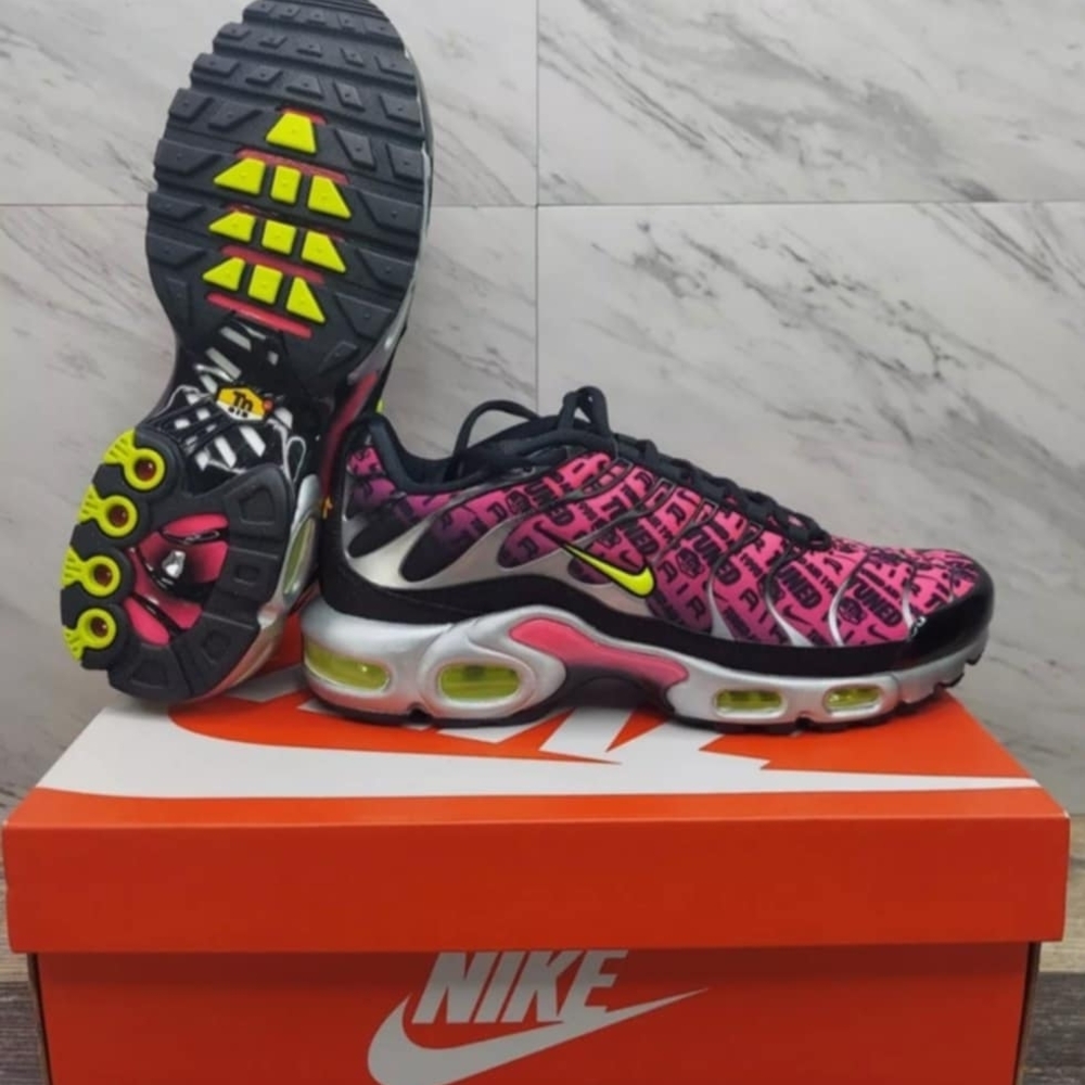 Nike Pink and Black Sneakers with Geometric Pattern